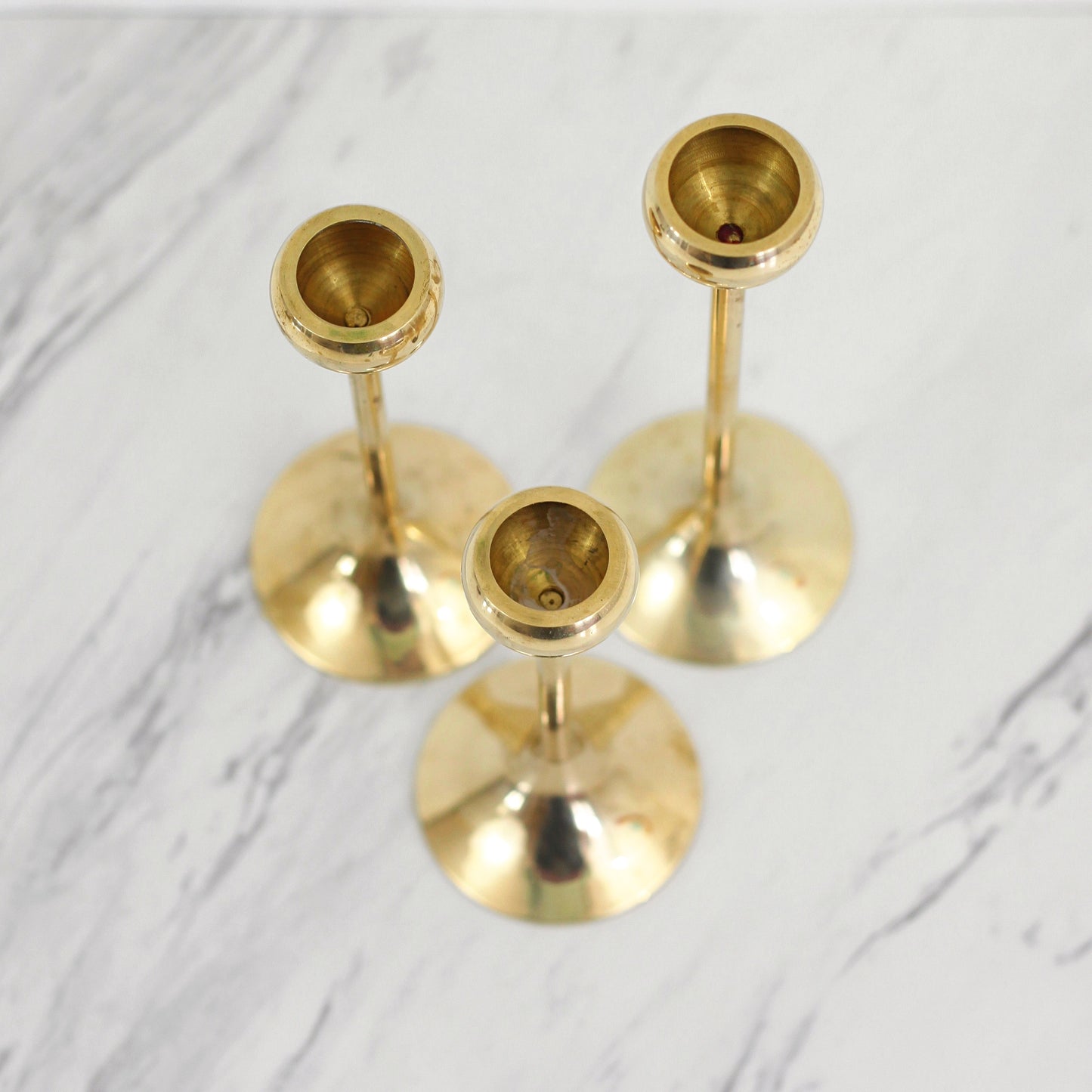 SOLD - Mid Century Graduated Brass Candlesticks