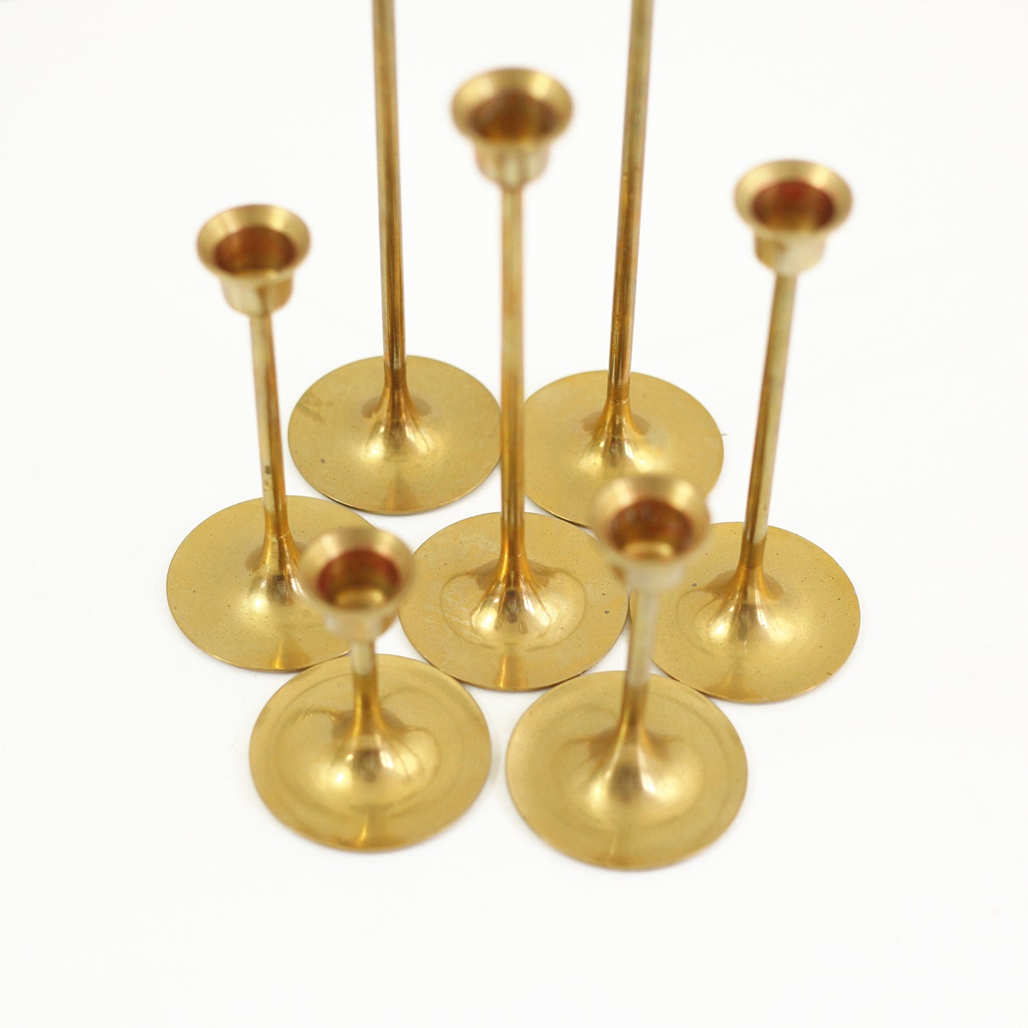 SOLD - Set of Seven Mid Century Modern Brass Candlesticks