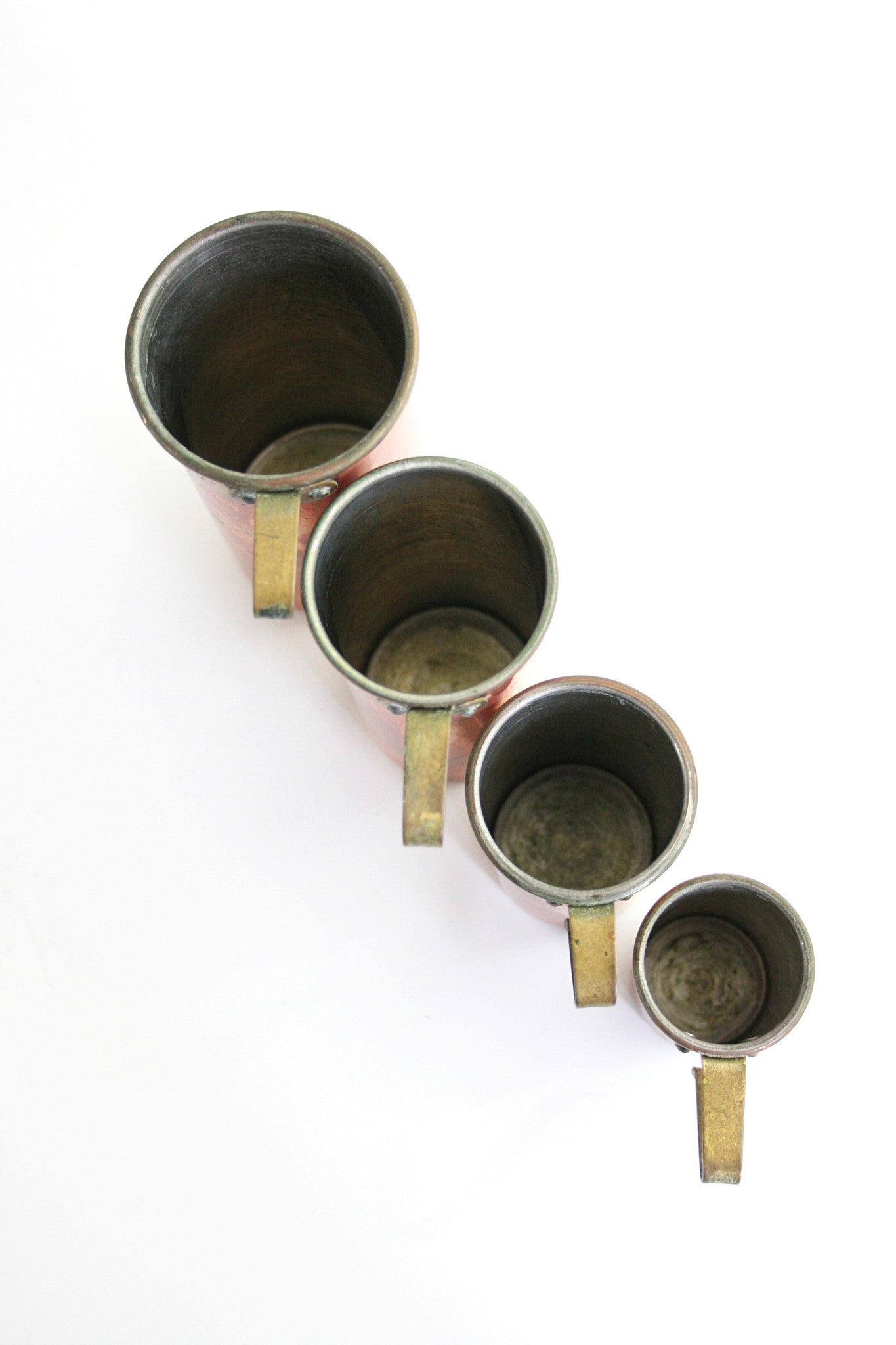 SOLD - Mid Century Copper and Brass Revere Ware Measuring Cups Set