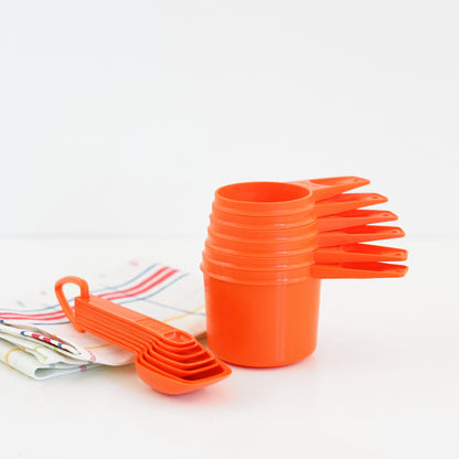 SOLD - Vintage Orange Tupperware Measuring Cups Set
