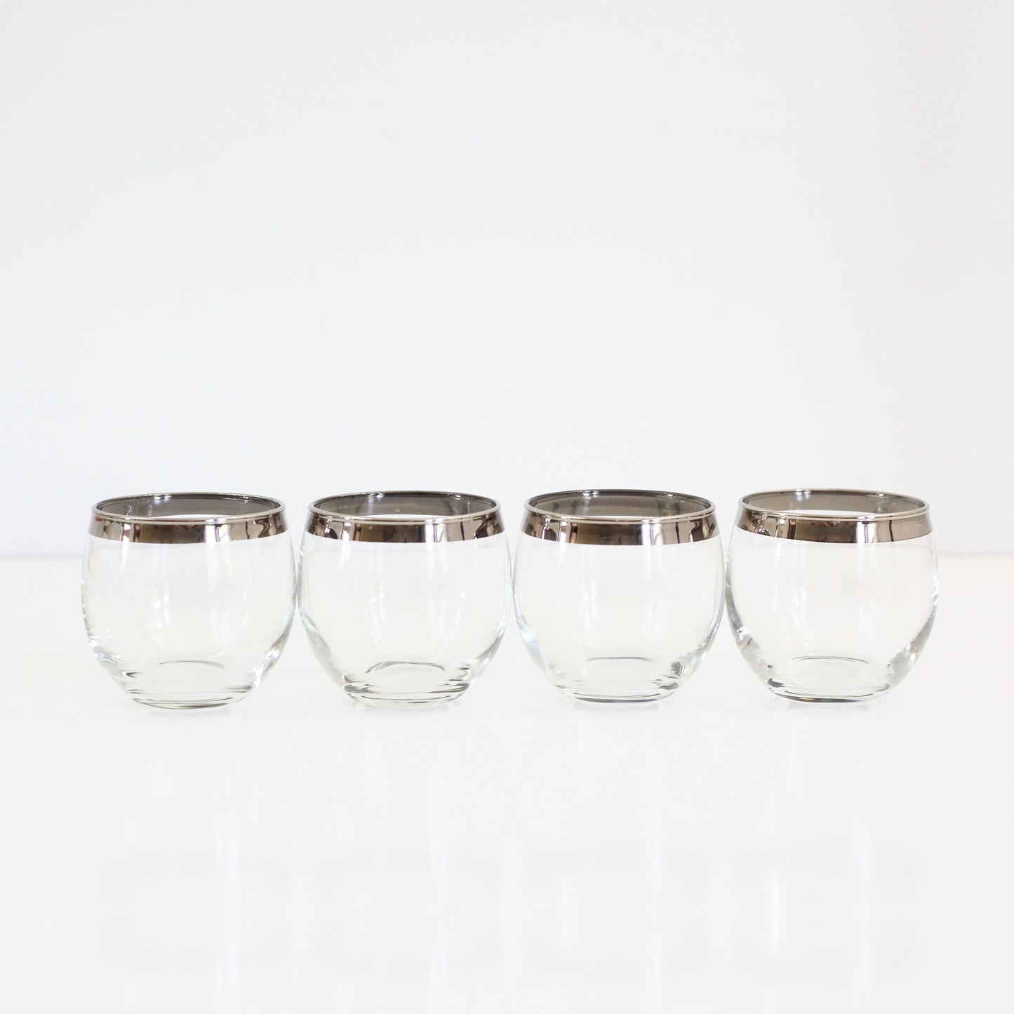 SOLD - Mid Century Modern Silver Rimmed Roly Poly Cocktail Glasses
