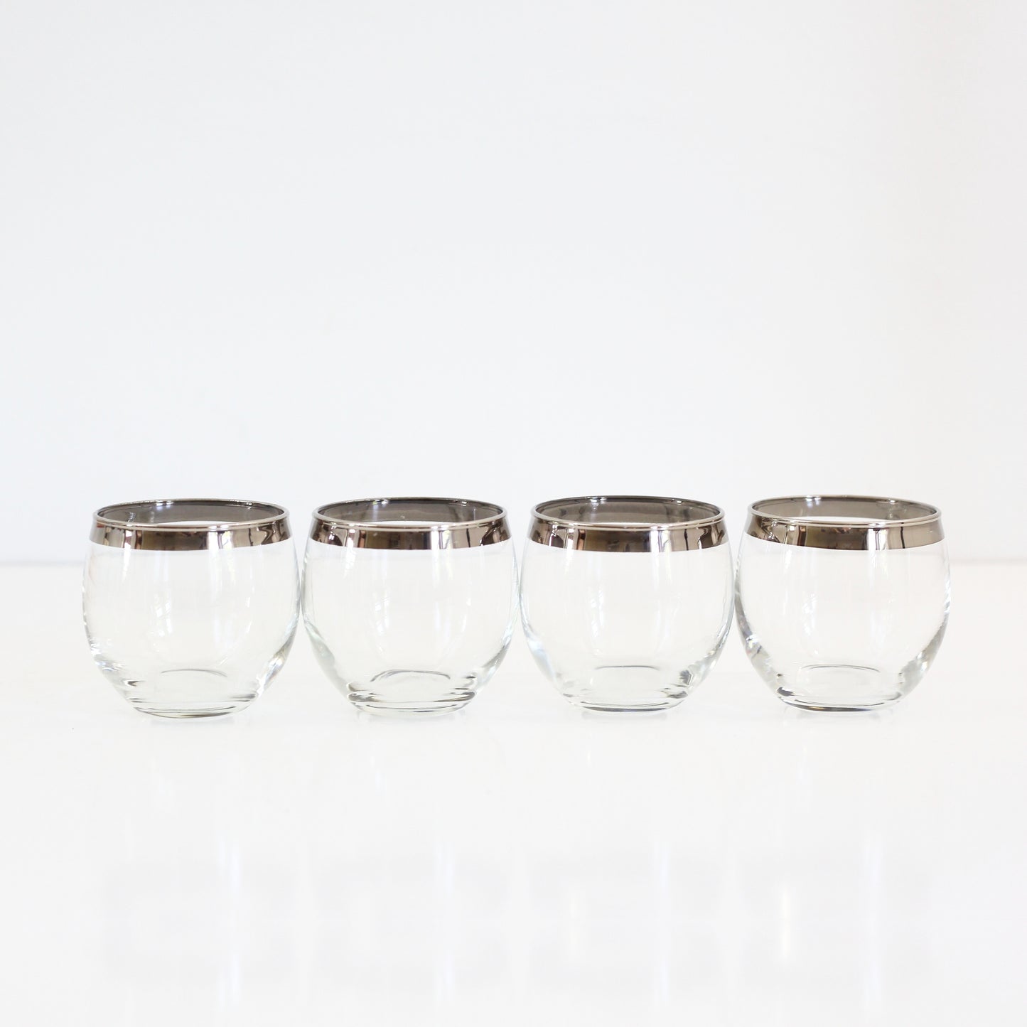 SOLD - Set of Four Silver Rimmed Roly Poly Glasses